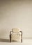 Conceptual vintage interior studio room with stucco wall. Creative composition fur armchair in warm pastel color. Mockup