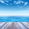 Conceptual wood deck over sea and sky