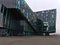 Concert hall and conference center Harpa in Reykjavik center with colorful patterned facade of glass inspired by basaltic rocks.