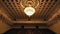 Concert Hall Opera. View of an empty theater with red seats and a balcony. Luxurious golden ceiling