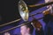 Concert view of a trombone player trombonist with musical jazz band performing in the background