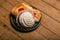 Concha and other sweet breads on wooden table.