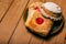 Concha and other sweet breads on wooden table.