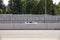 Concrete acoustic barriers decorated with a structural pattern. Protection of residents against noise generated by car traffic and