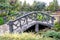 Concrete arched bridge in the park look like wooden bridge,Cement bridge