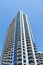 Concrete Balconies Up Blue and White Condo tower