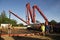 Concrete being pumped onto a new foundation slab.