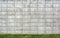 Concrete Block Wall Background with Grass