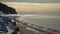 Concrete blocks and Baltic sea in the winter evening, Uzava, Latvia