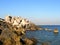 Concrete breakwaters. Seascape with concrete tetrapodes to protect coastal structures from destructive impact of storm sea waves.