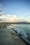 Concrete city breakwater and waves at the black sea.