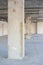 Concrete column in unfinished interior under construction