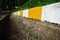 Concrete curb and gutter White and yellow