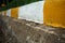 Concrete curb and gutter White and yellow