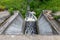 Concrete dam seen from above. Small hydropower plant