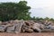 Concrete debris piles near rural trees