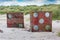 Concrete dice on foreshore near Bamburgh England