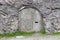 Concrete door in a mountain