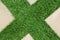 Concrete Floor and Green Artificial Grass