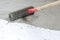 . concrete floor. on the horizon. close-up. needle roller for removing air bubbles. have toning. then there will be painting