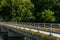 Concrete footbridge in wilderness park