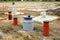 Concrete footings for steel columns at the construction site of a new industrial building