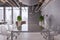 Concrete glass office interior with window and city view, coworking and meeting areas, decorative plants. Design and style concept