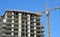 Concrete Highrise Construction site, with Tower Crane