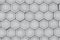 Concrete honeycombs on the surface. Gray hexagonal tiles, honeycomb tiles texture background