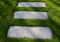 Concrete path lawn pedal rectangular shape in regular grid routed directly through beautiful lawn suns and shadows stone