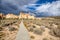 Concrete path into the Utah Desert Grosvenor Arch