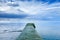 Concrete pier or jetty on a blue sea and cloudy sky. Normandy, France