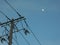 Concrete pillar with wires and moon