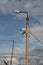 Concrete pole lantern with CCTV cameras against the blue sky.