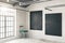 Concrete room with two chalkboards