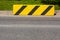 Concrete safety block installed on the side of the road