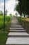 Concrete stairs going upwards in a green park