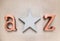 Concrete star and metal letters A and Z