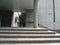 Concrete steps in front of the office center entrance. Gray urban grunge background for your design.