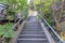 Concrete straight staircase in the middle of residential buildings in San Francisco, California