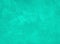 Concrete texture toned in the trendy color Aqua Menthe. Stucco wall background