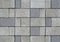 Concrete tiles of different shades of gray and shapes for exterior floor
