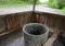 Concrete well for water under a wooden roof
