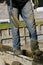 Concrete worker walks on tops of cement forms