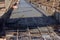 Concreting the base of the building. Construction worker Concrete pouring during commercial concreting floors of building in