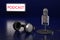 Condenser microphone, headphones and sign with the text `podcast` on a dark blue background.