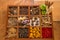 Condiments and spices in the wooden box on the table