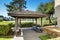 Condo apartment homes overlooking a small lake with a gazebo.