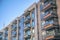 Condominiums with balconies against blue sky in Tucson Arizona neighborhood