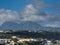 Condos Under Mountains in Clouds